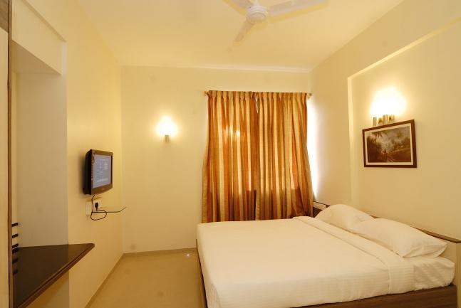 バンガロール パール スイーツアパートホテル 部屋 写真