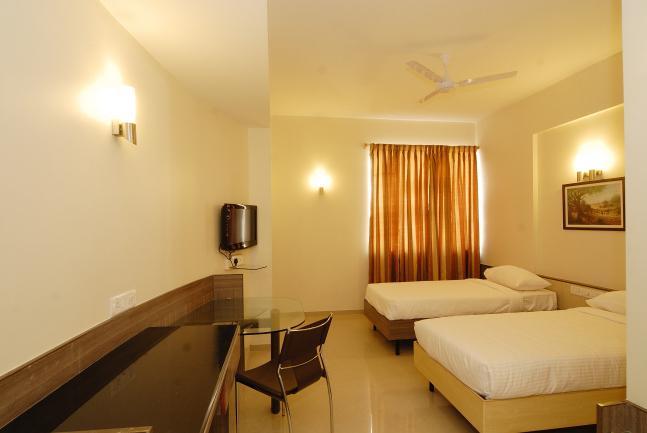 バンガロール パール スイーツアパートホテル 部屋 写真