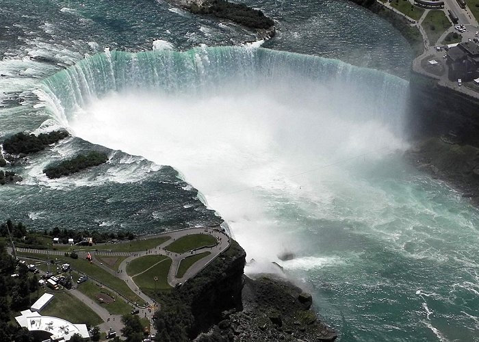 Horseshoe Falls Man swept over Canadian side of Niagara Falls survives 57-meter ... photo