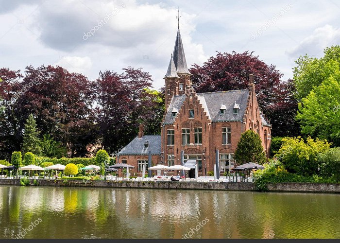 Castle Minnewater Castle della Faille along Minnewater lake in old town of Bruges ... photo